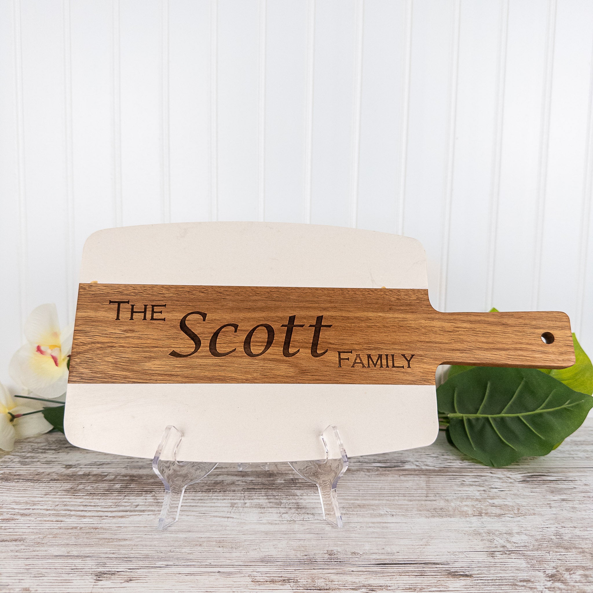 Acacia and Marble cutting board personlized with a family name