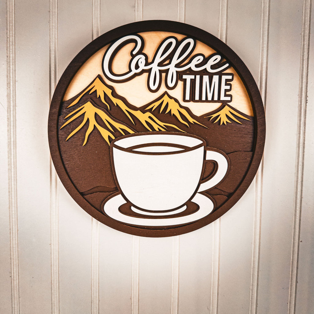Circular wooden sign with coffee time text and cup